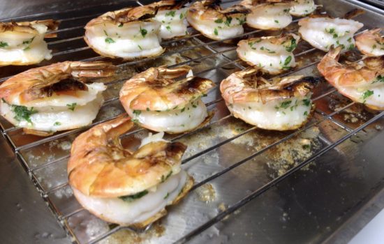 Oven-Broiled Peel-and-Eat Shrimp with Garlic-Butter Zip Sauce