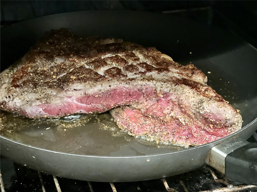Perfectly seared cross hatched fat cap of a Pan-Seared Oven-Finished Tri-Tip