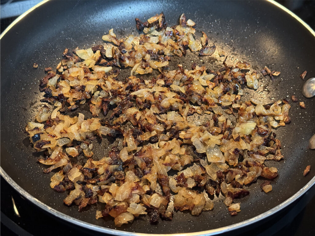Deeply caramelized onions in saute pan